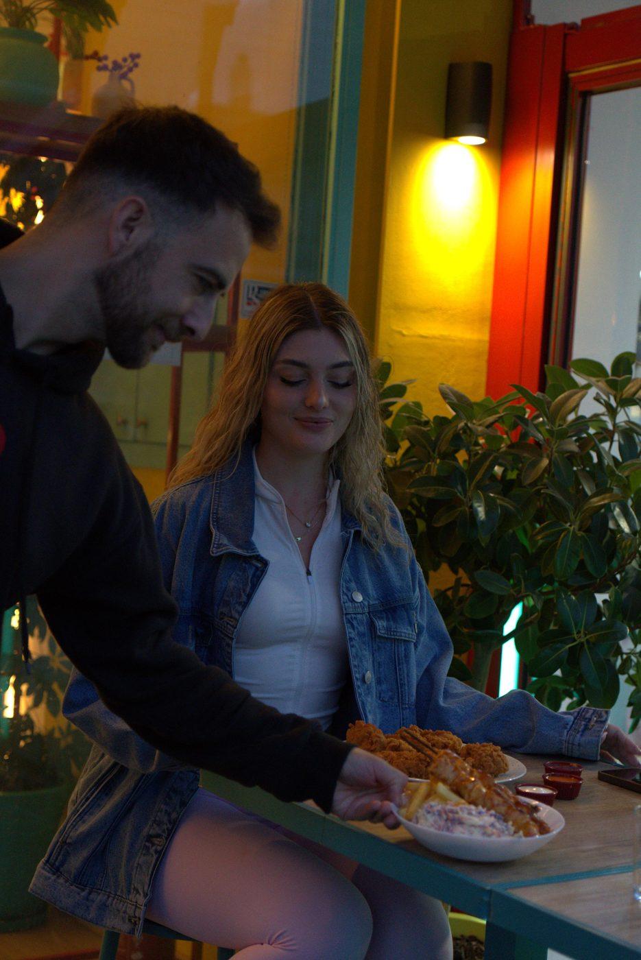 Couple dining at Kokolokos in the evening