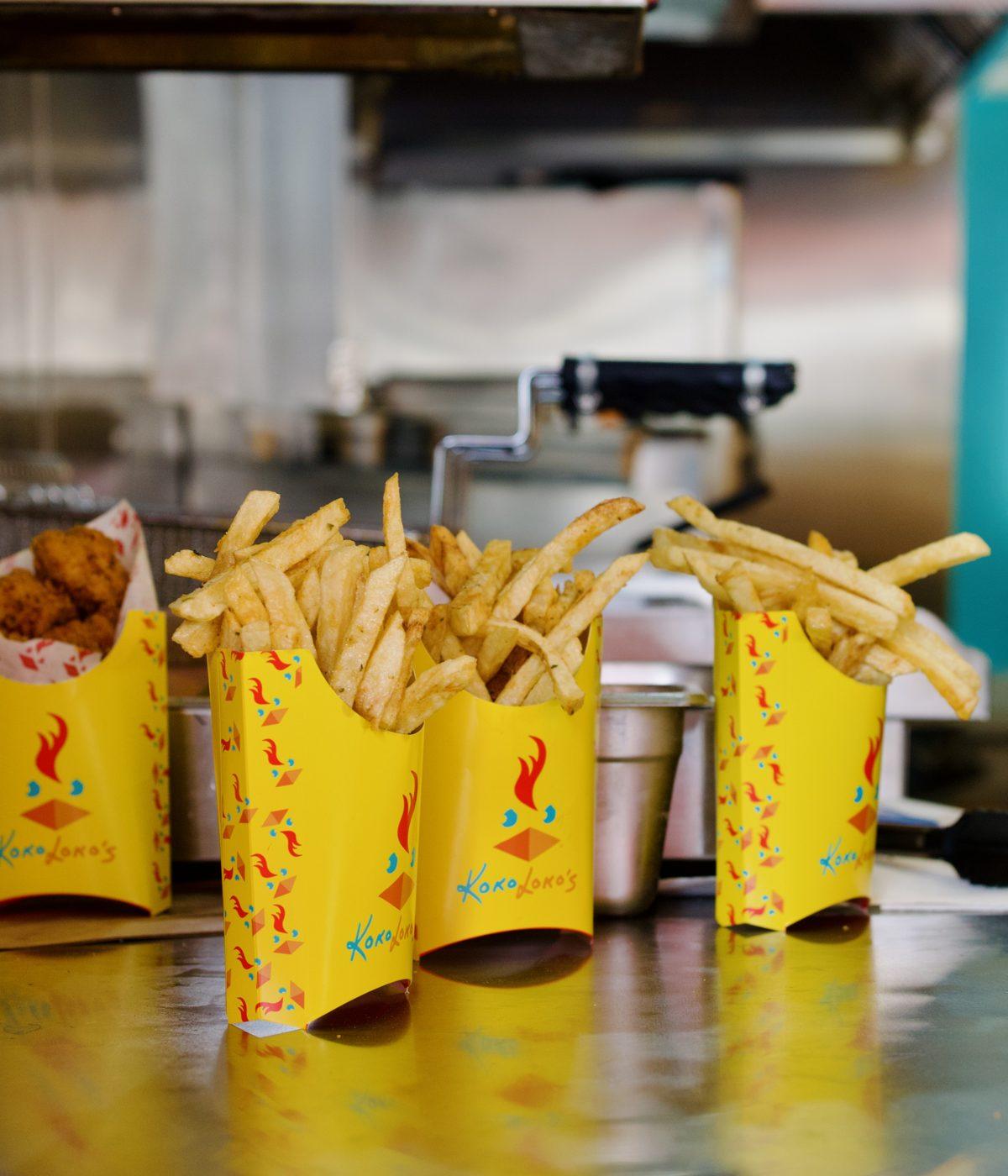 Fresh fries in Kokolokos-branded sleeves