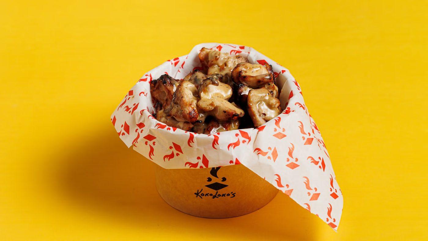 Wings served in Kokolokos wax paper